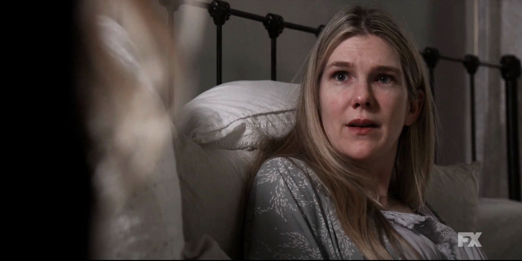 Doris (Lily Rabe) recovering in bed in S10, E5 of 'American Horror Story: Double Feature: Red Tide.'