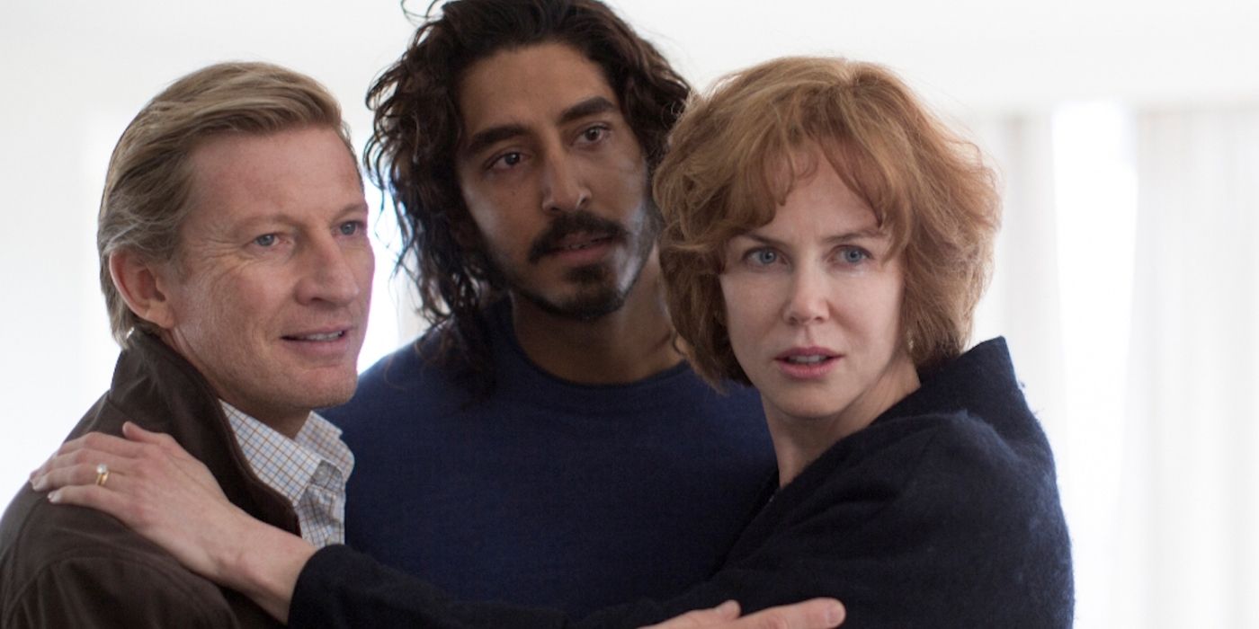 David Wenham, Dev Patel, and Nicole Kidman holding each other in &lsquo;Lion&rsquo;