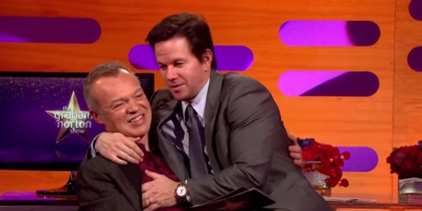 Mark Wahlberg sits in Graham's lap on 'The Graham Norton Show'.