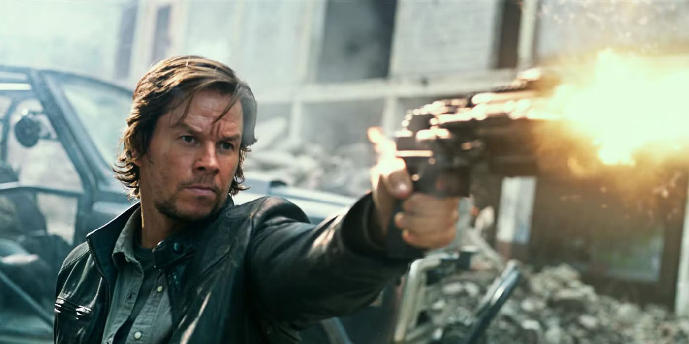 Mark Wahlberg as Cade Yeager firing off a pistol in 'Transformers: The Last Knight' (2017)