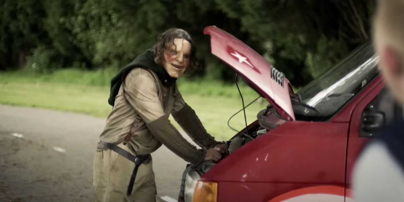 Martin Portlock, fixing his car engine, as Peter Pan in Peter Pan's Neverland Nightmare