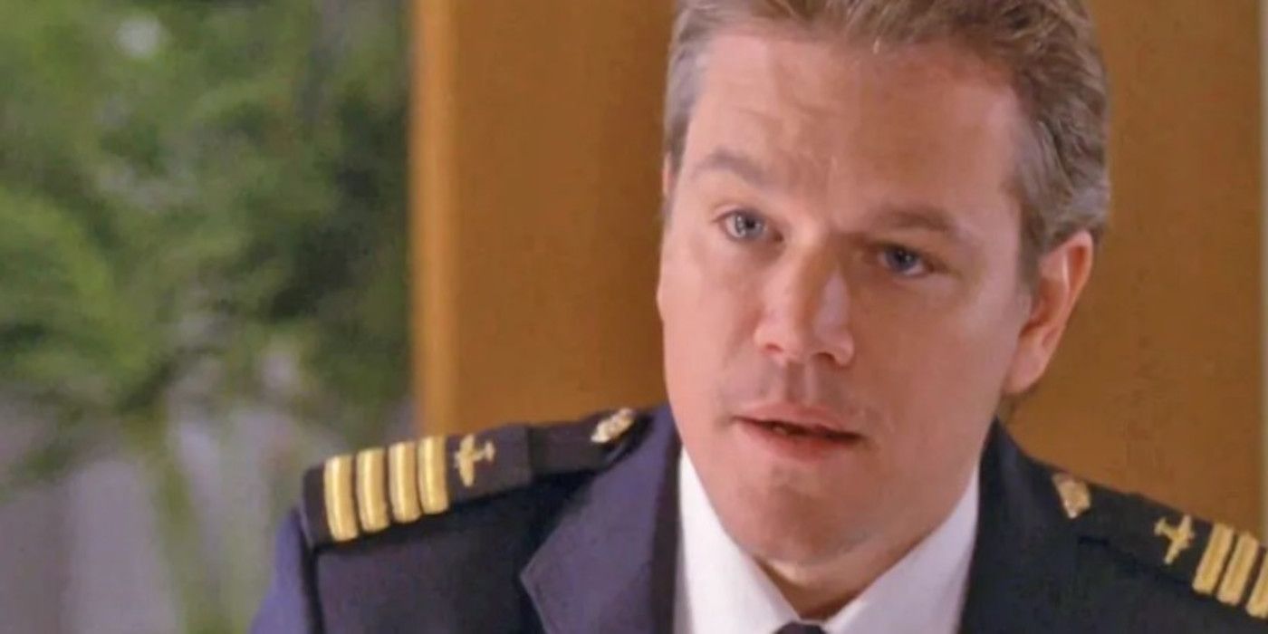 Matt Damon as Carol sits and looks at something off-screen in his pilot uniform on 30 Rock.