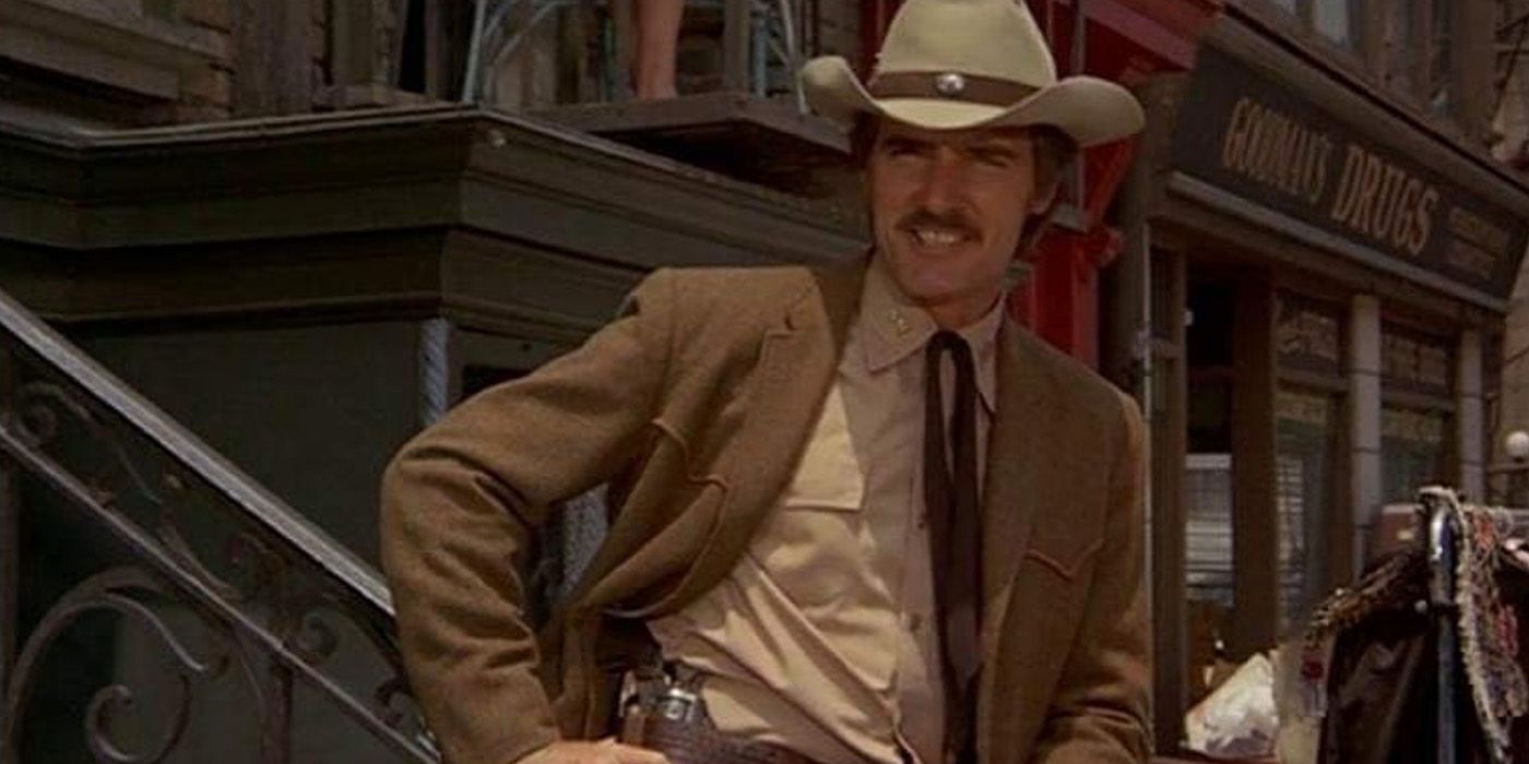 Sam McCloud (Dennis Weaver) stands at a New York City street corner on 'McCloud'