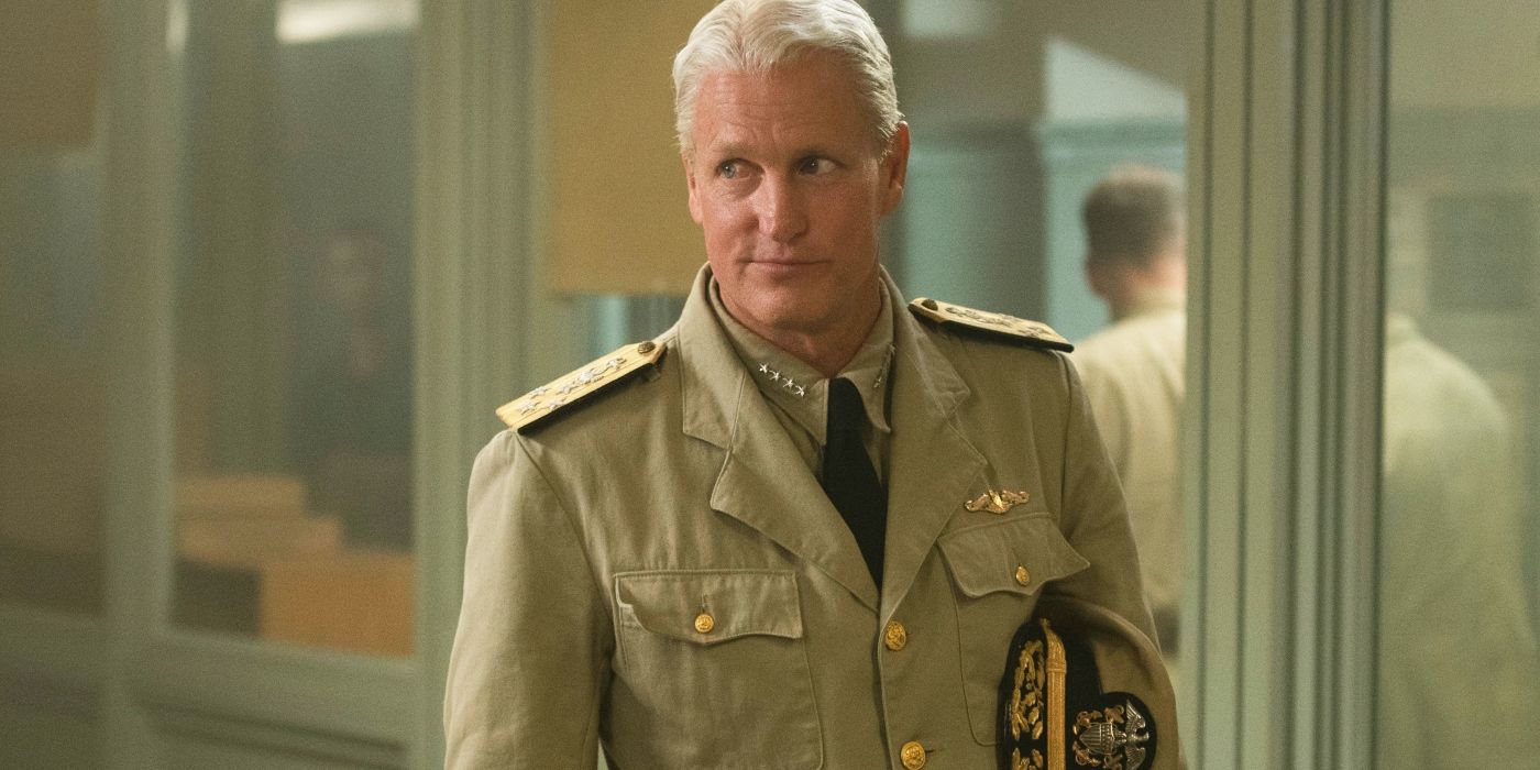 Woody Harrelson smirking as Admiral Chester in Midway