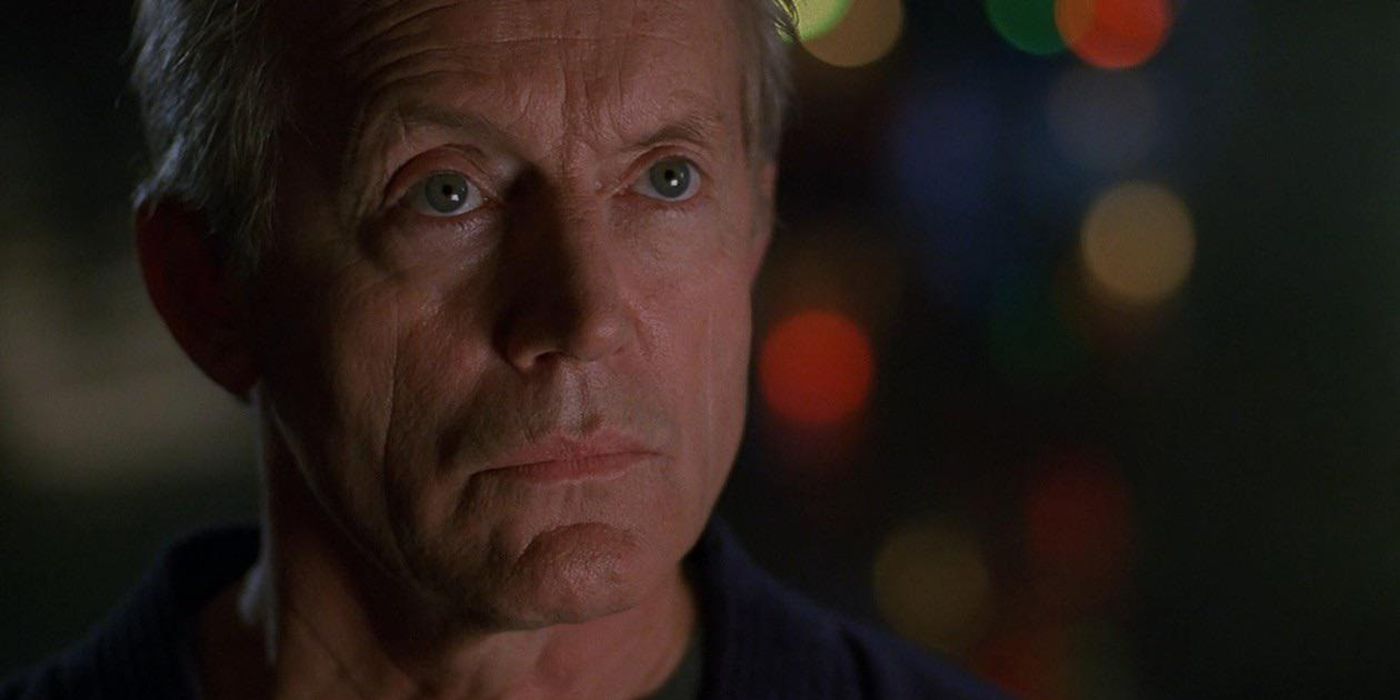 The close up of a man staring in Millennium.