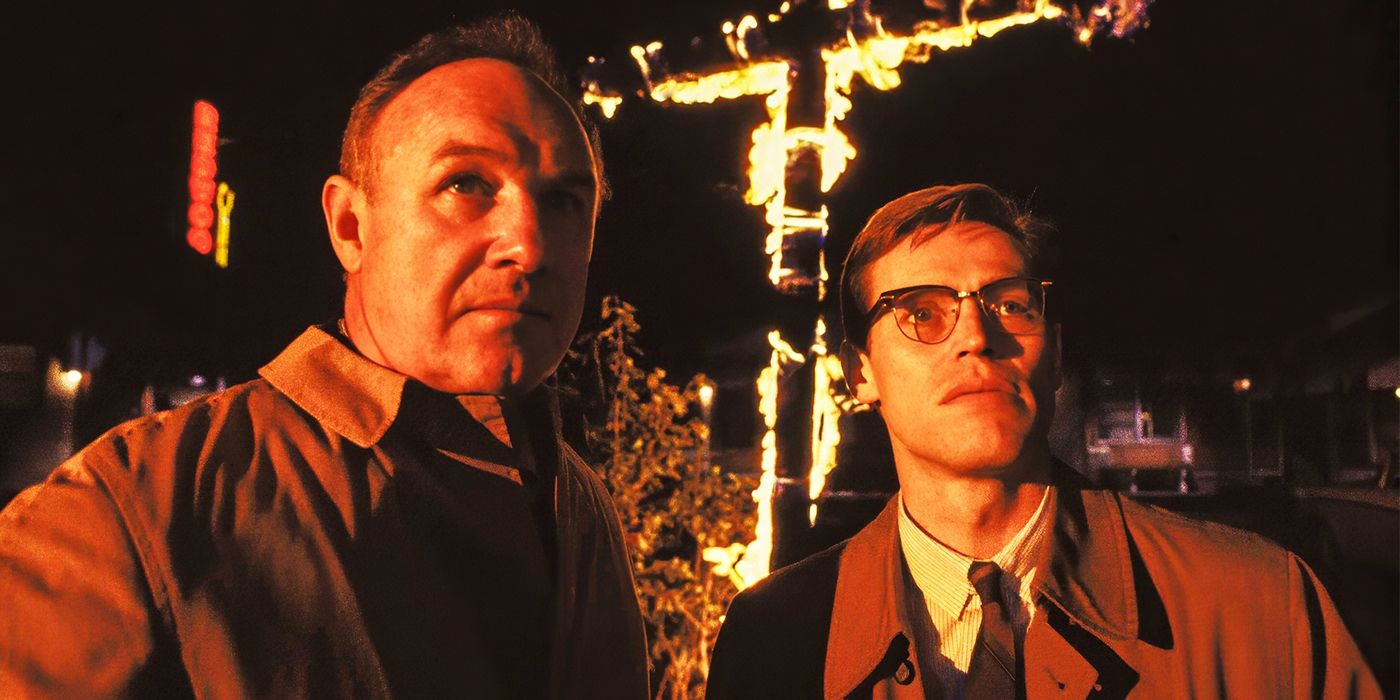 Willem Dafoe and Gene Hackman stand in front of a burning cross in Mississippi Burning