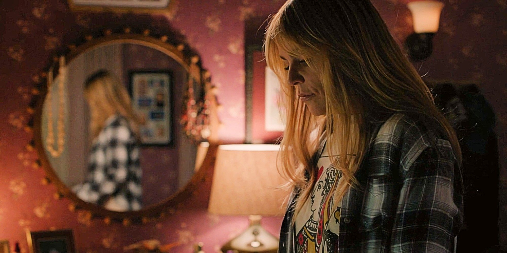 Kaitlin Olson as Morgan Gillory looking down with her reflection appearing in the mirror behind her in High Potential Season 1 Episode 9 &ldquo;The RAMS&rdquo;