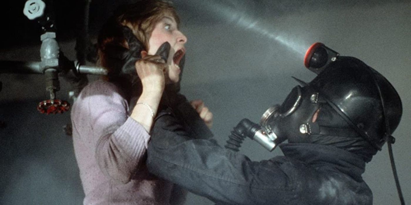 A miner holding up a screaming woman in My Bloody Valentine