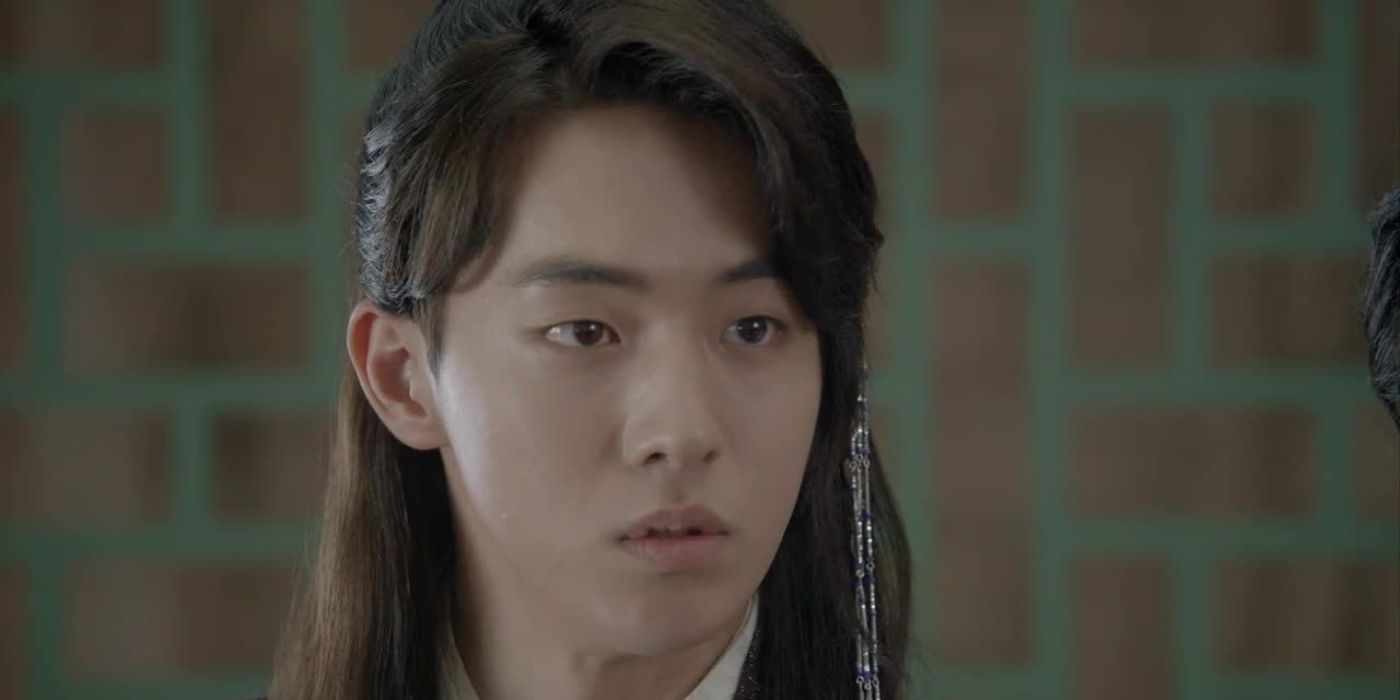 Nam Joo-hyuk with longer hair looks at something off camera in Moon Lovers: Scarlet Heart Ryeo.