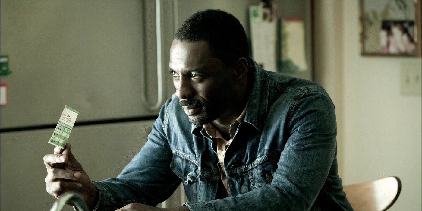 Idris Elba holding a piece of paper in No Good Deed (2014)