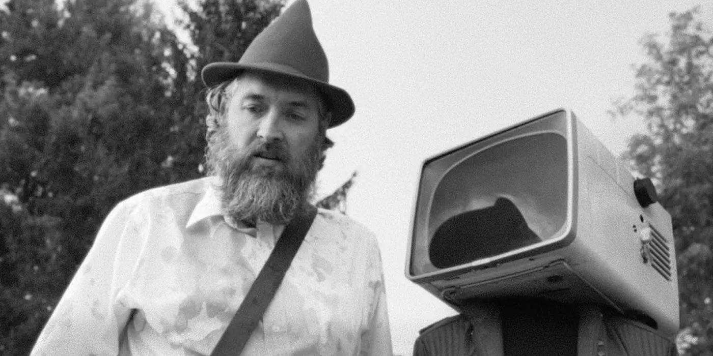 Albert Birney as Conor next to a TV in OBEX