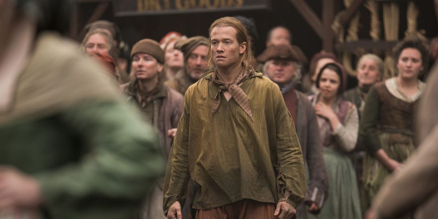 Stephen Bonnet looks distressed in a crowd of people in Outlander Season 4 Episode 1 America the Beautiful.