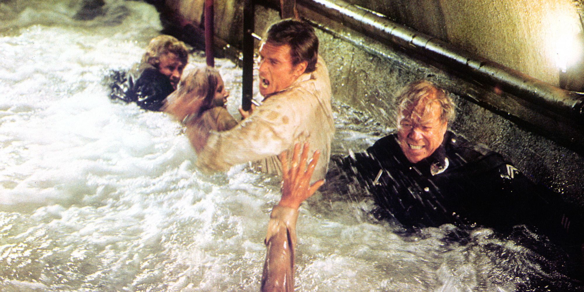 Charlton Heston and other people swimming in the sewers in 'Earthquake' (1974)