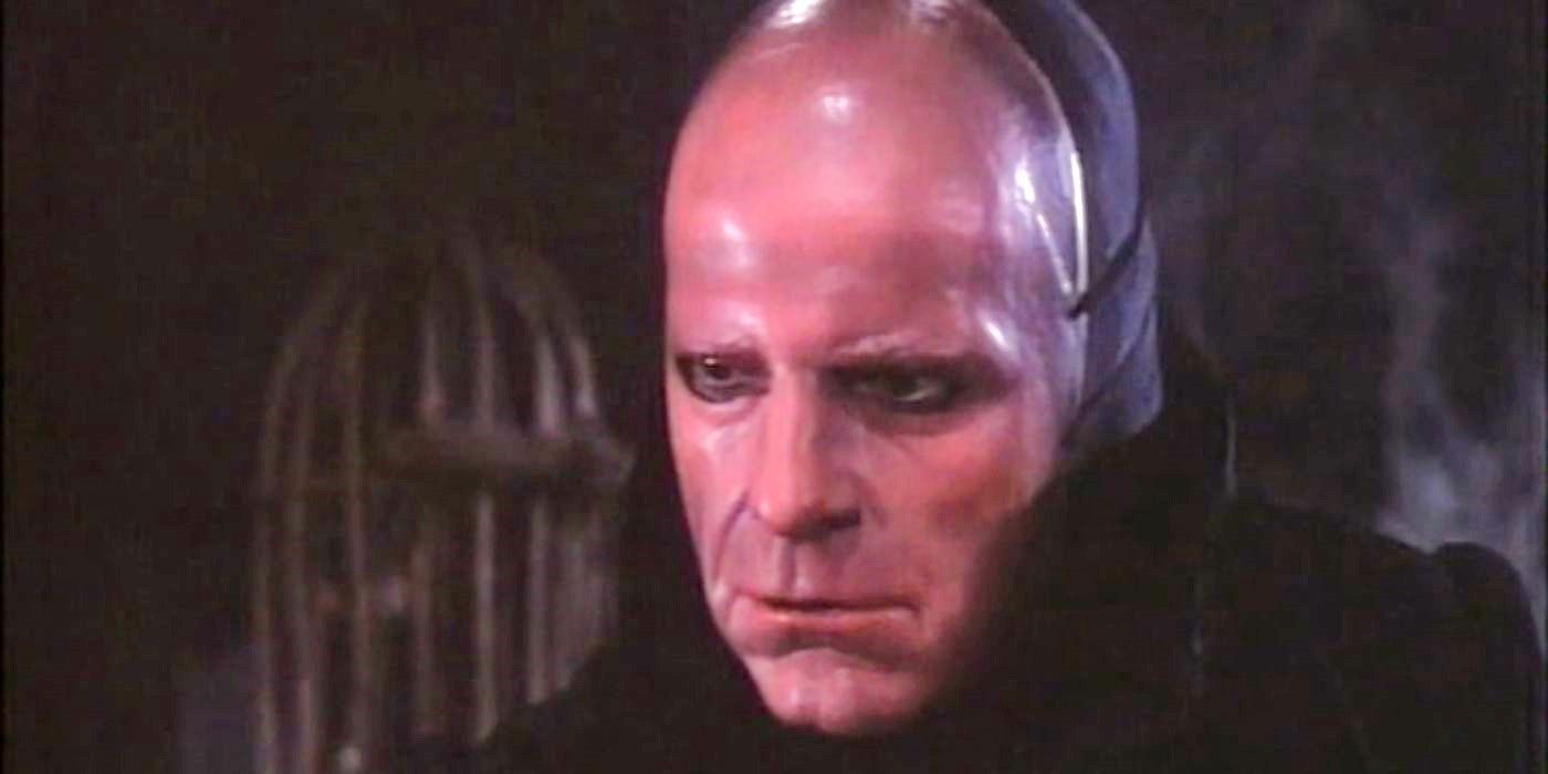 The Phantom wears a normal face mask and looks sinister in The Phantom of the Opera (1983).