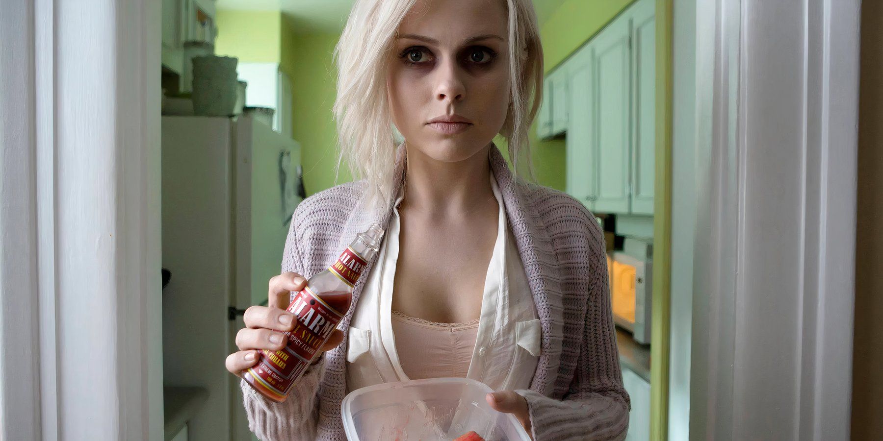 Liv eating brains from a dish using a sauce bottle in the iZombie series.