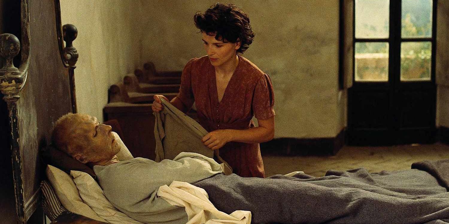 Juliette Binoche as Hana tending to a heavily scarred Ralph Fiennes in The English Patient