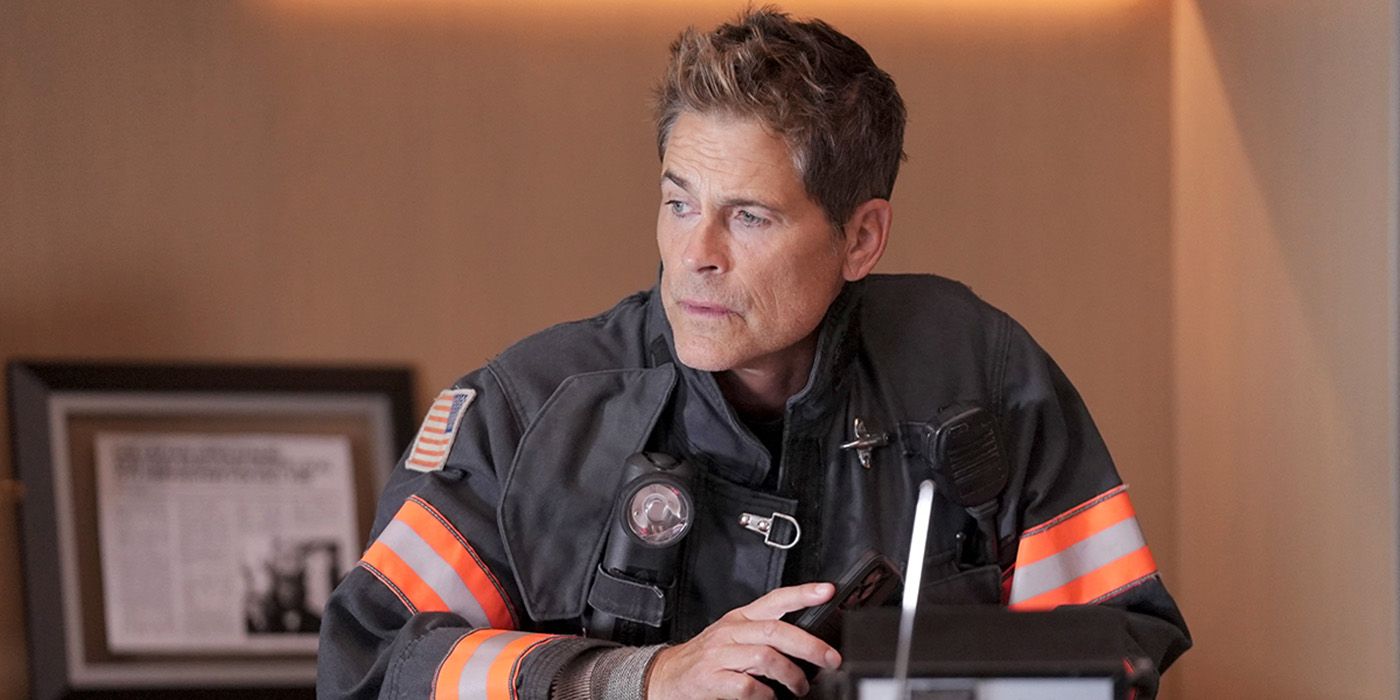 Rob Lowe sitting at a desk in 9-1-1: Lone Star Season 5 Episode 11 