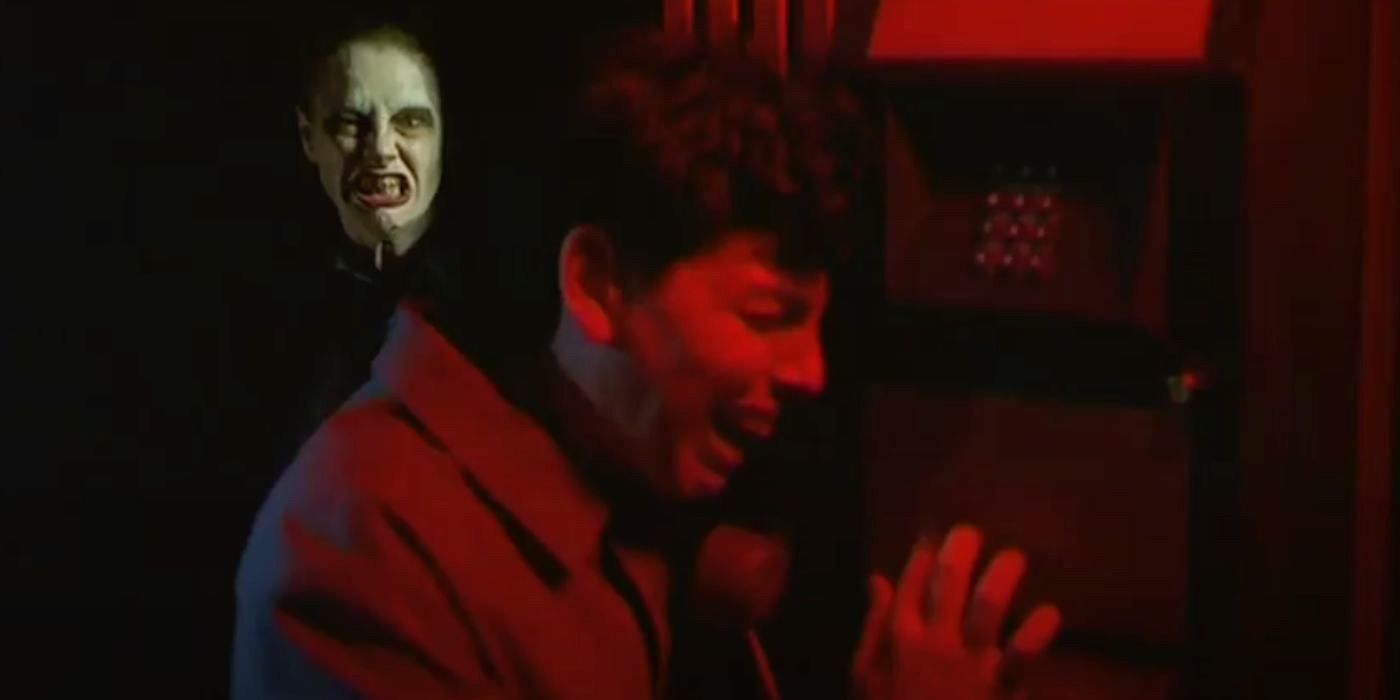 A creepy scene with a ghoulish man behind a distressed young killer in director Luca Guadagnino&rsquo;s first film, The Protagonists (1999).