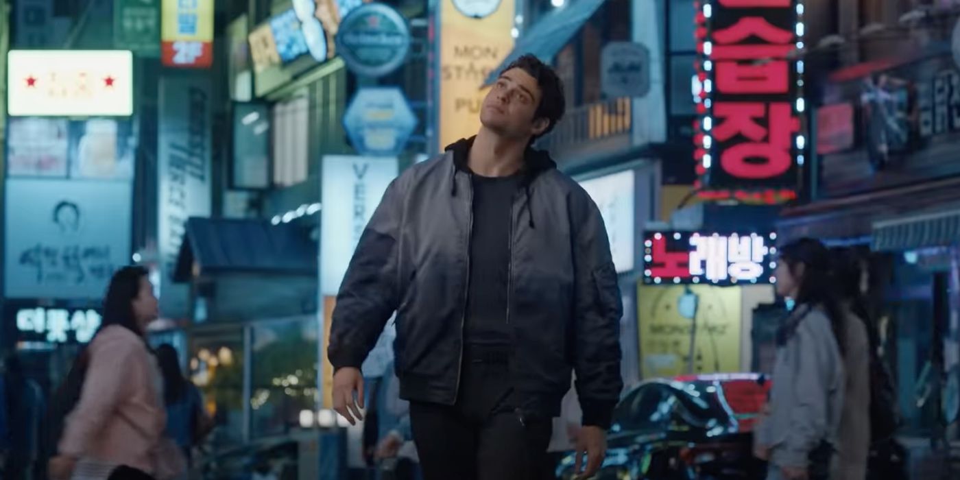 Noah Centineo as Owen walking in South Korea in 'The Recruit' 