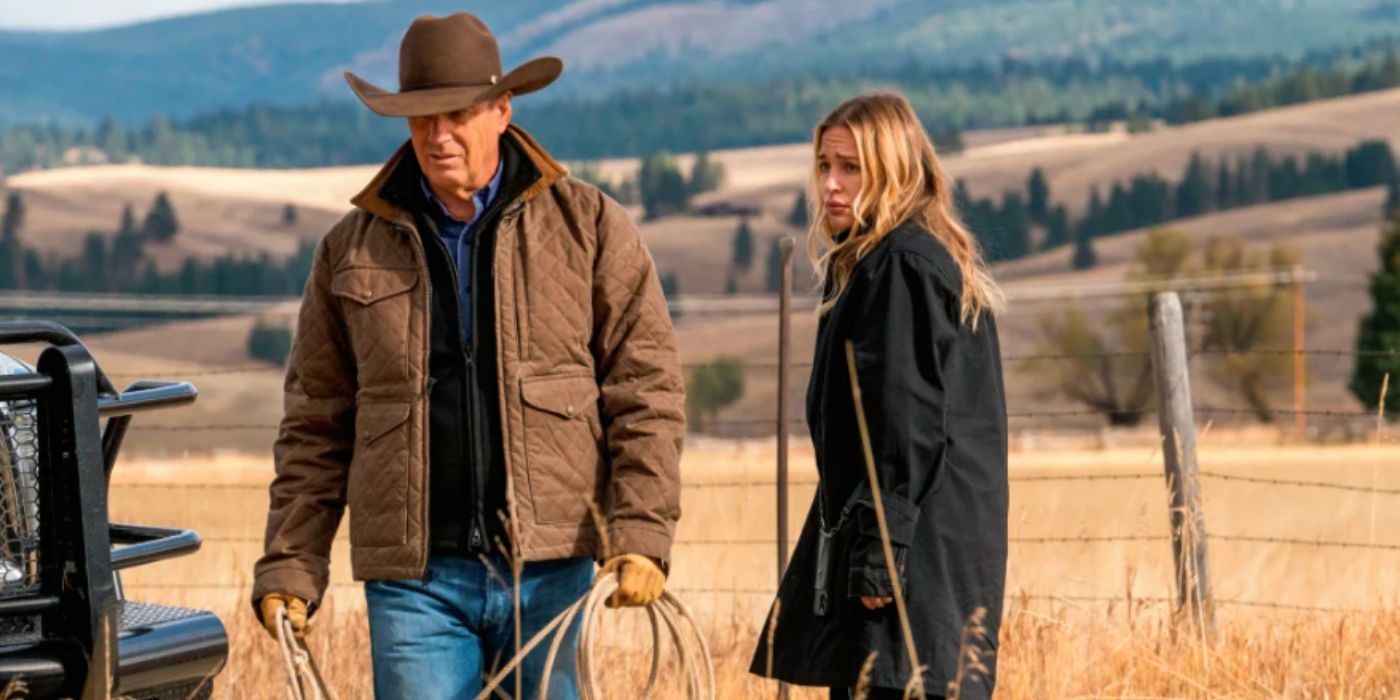 Kevin Costner and Piper Perabo as John Dutton and Summer Higgins wearing a cowboy hat and a black jacket standing in a field in 'Yellowstone'