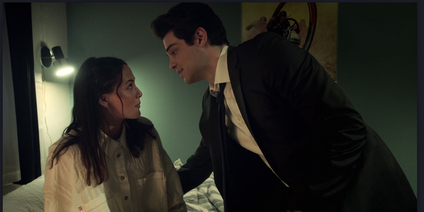 Fivel Stewart as Hannah and Noah Centineo as Owen look concerned as they talk to each other in The Recruit.
