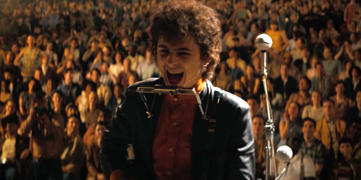 Bob Dylan (Timothée Chalamet) performs at the 1965 Newport Folk Festival in A Complete Unknown (2024).