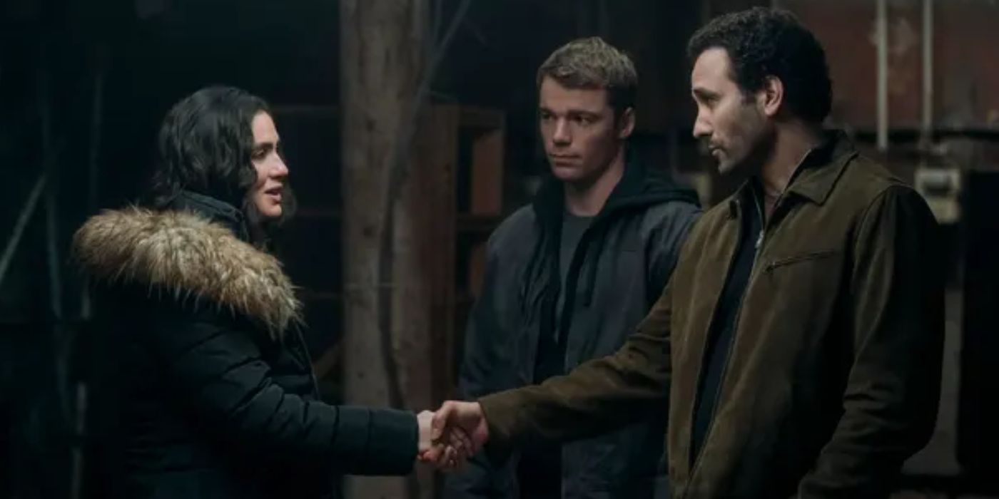 Arienne Mandi as Noor shaking hands with Marwan Kenzari as Reza shaking hands with Gabriel Basso as Peter looking on in Season 2 of 'The Night Agent'