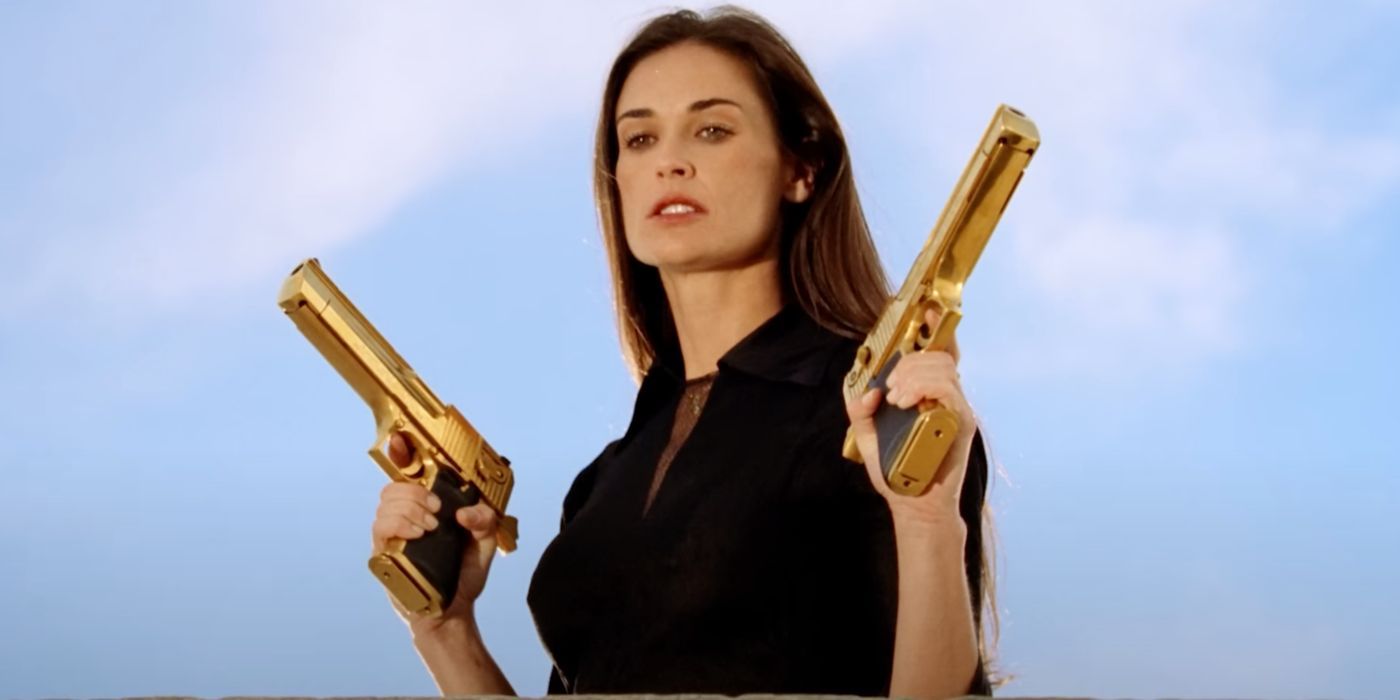 Madison Lee (Demi Moore) poses with a pair of golden guns in the spy sequel Charlie&rsquo;s Angels: Full Throttle (2002).