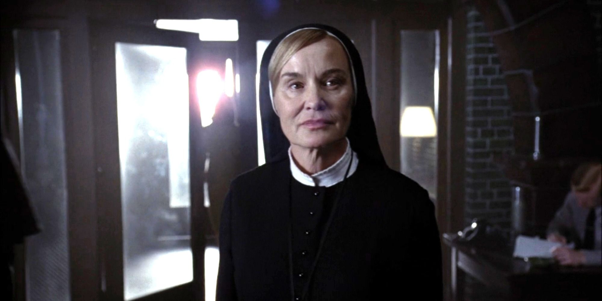 Sister Jude (Jessica Lange) stands in Briarcliff&rsquo;s entrance in episode 13 of &lsquo;American Horror Story: Asylum.'