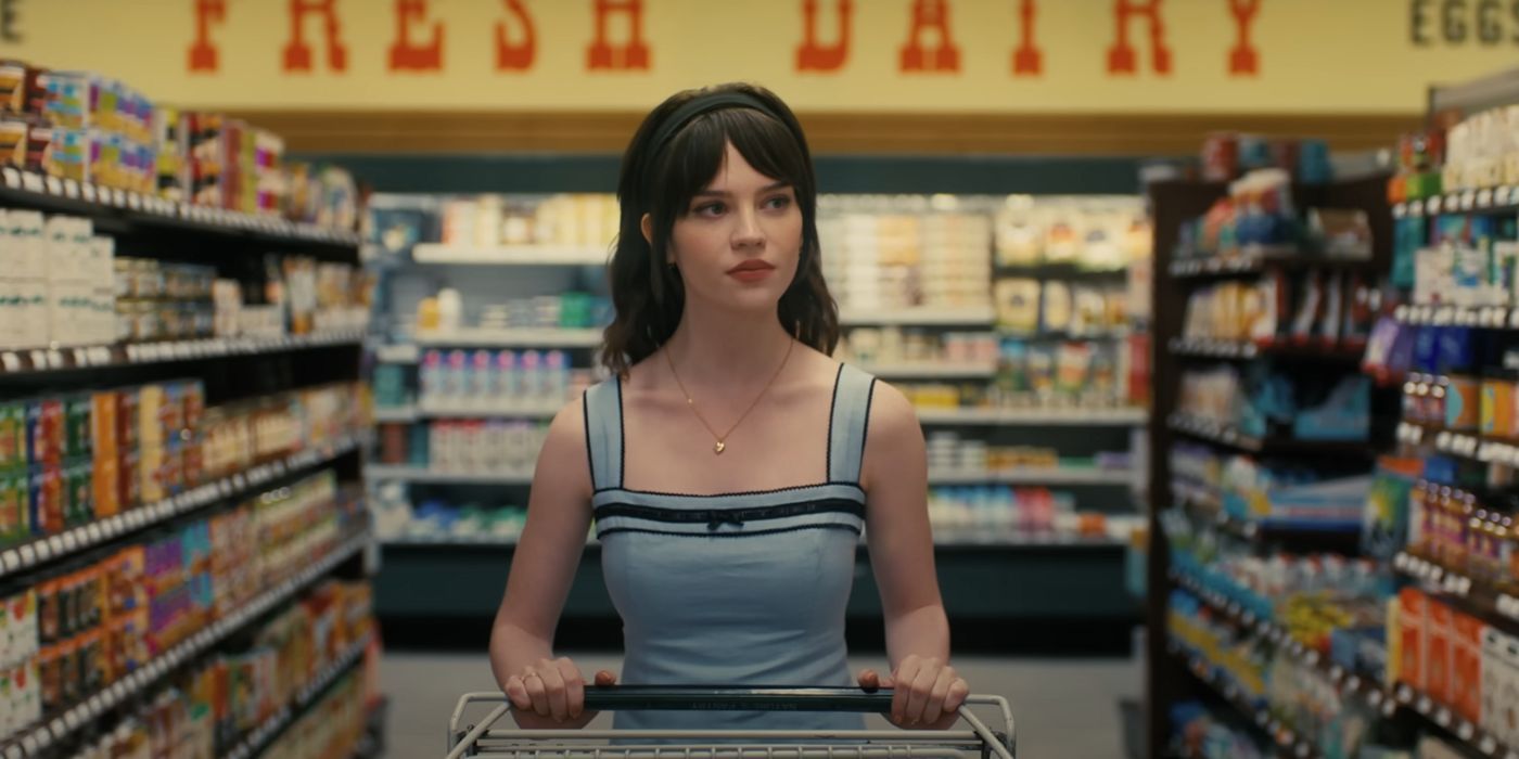 Sophie Thatcher as Iris pushing a shopping cart through the store in 'Companion'