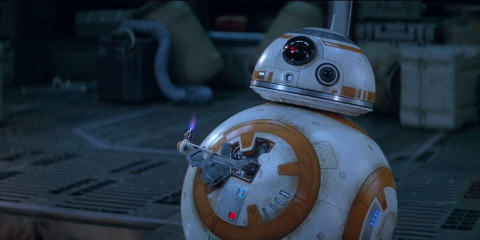 BB-8 does his best to give a thumbs up by using a lighter in Star Wars: The Force Awakens.