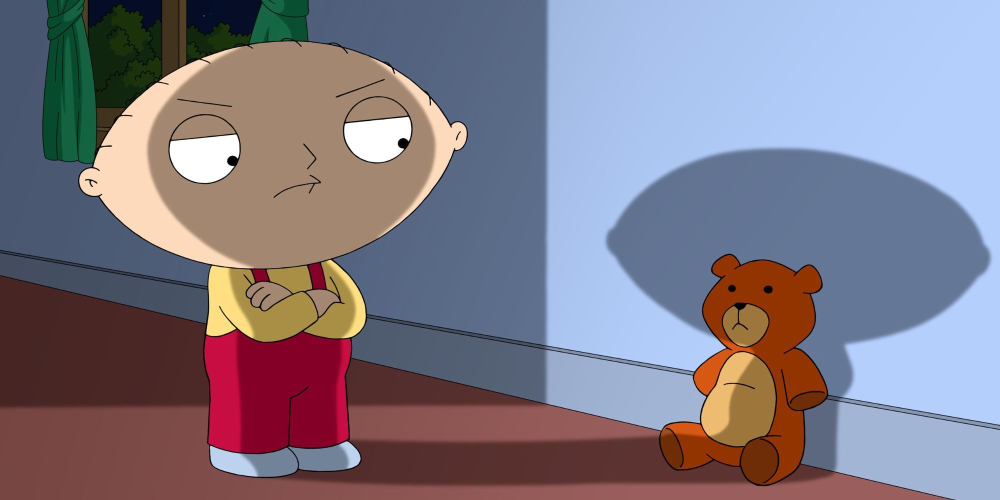 Stewie standing in front of his teddy bear Rupert with his arms crosses over his chest in Family Guy episode The Talented Mr. Stewie