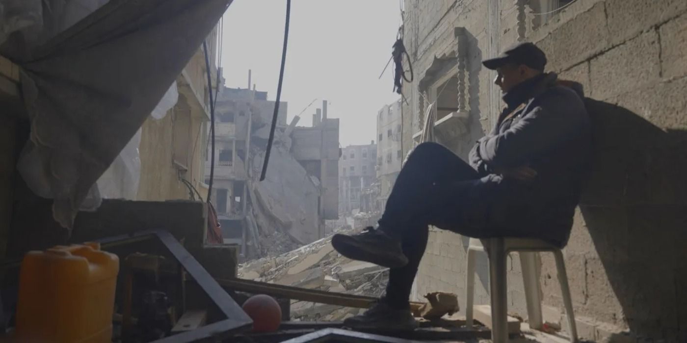 A man sitting on a chair in 'From Ground Zero'