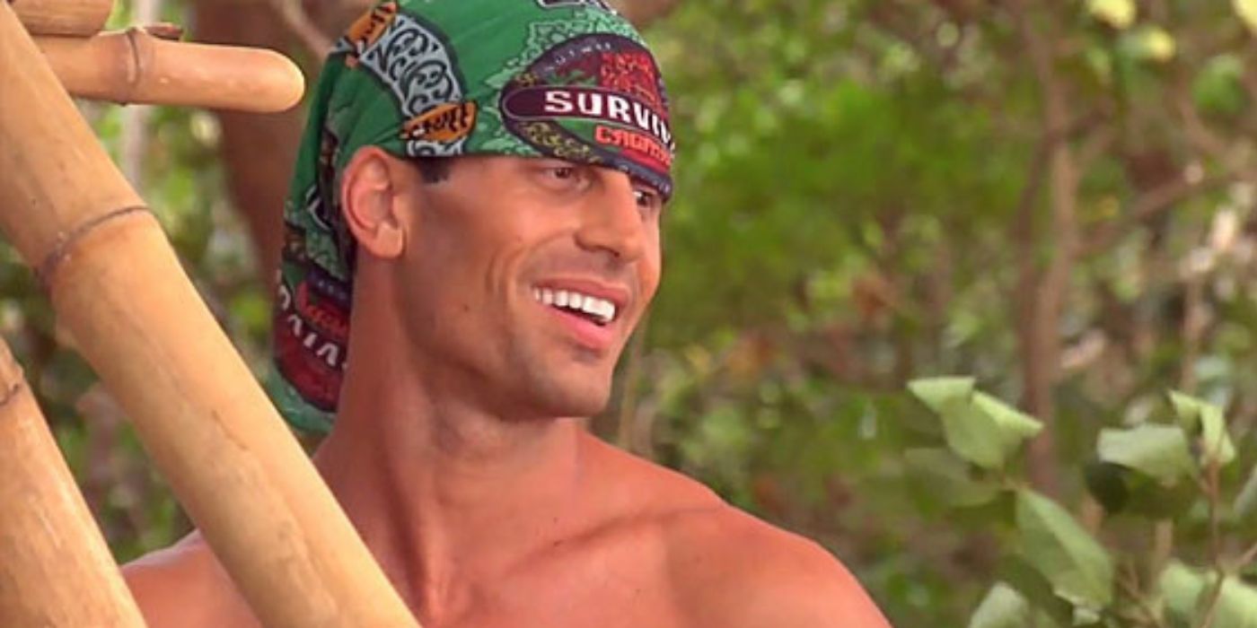 Garrett Adelstein smiles wearing a bandana on his head on &lsquo;Survivor: Cagayan.'