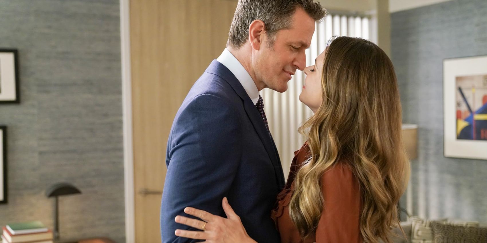 Charles (Peter Hermann) kisses Liza (Sutton Foster) in Younger