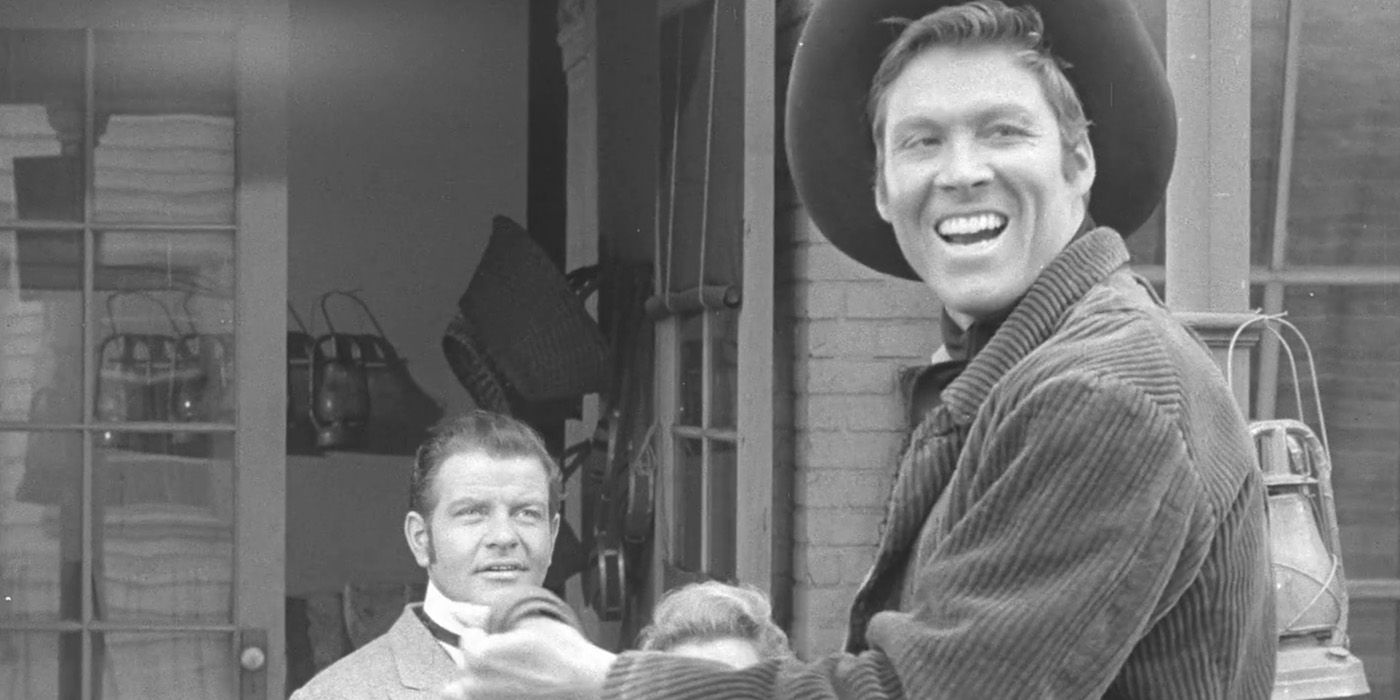 Dion Patrick (Adam Kennedy) smiles on horseback while passing by Jack McGivern (Sean McClory) and Martha McGivern (Nan Leslie) on &lsquo;The Californians&rsquo;