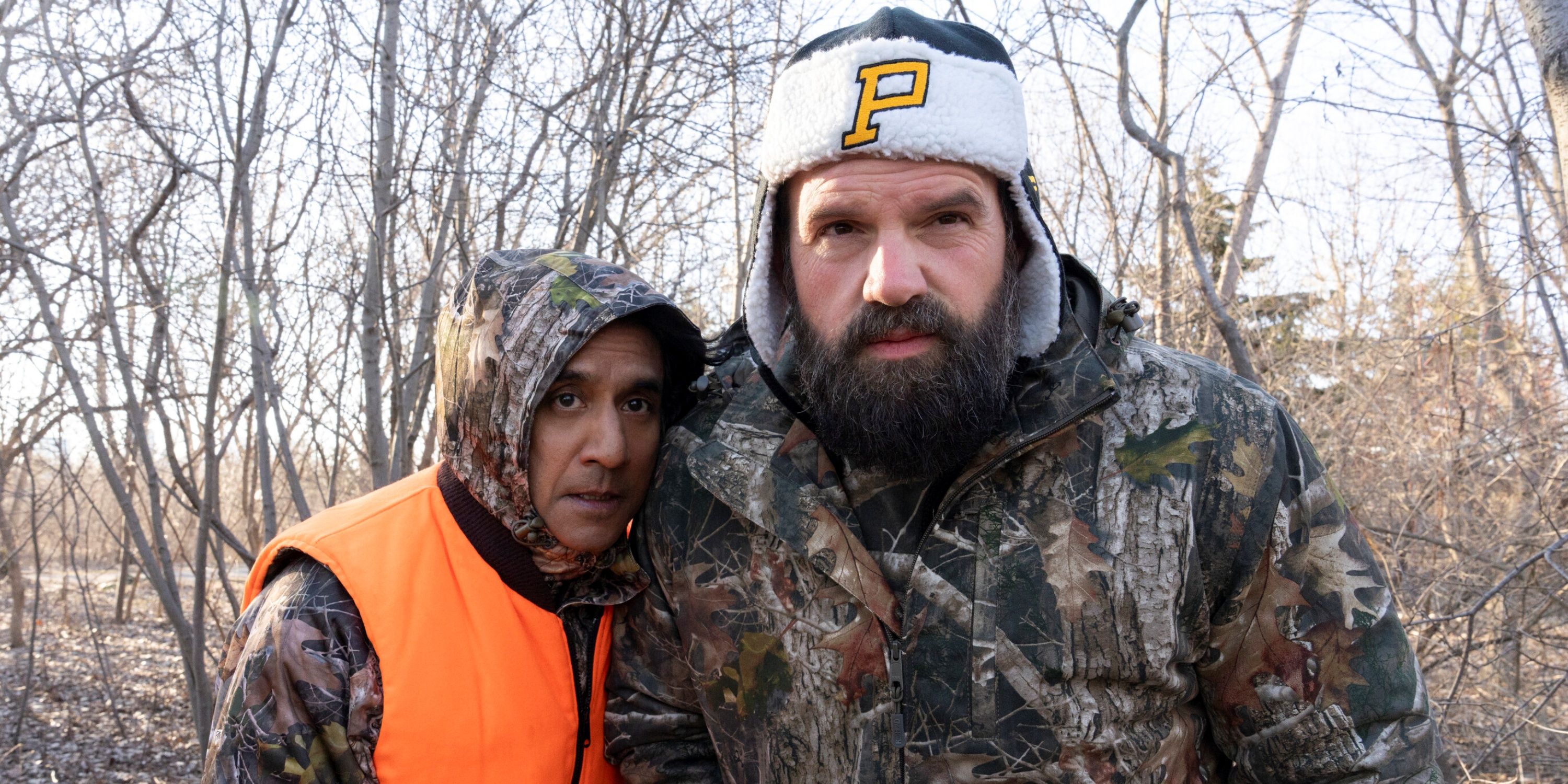 Naveen Andrews as Mahesh Pradeep dressed in camo with Ethan Suplee as Jimbo in The Pradeeps of Pittsburgh