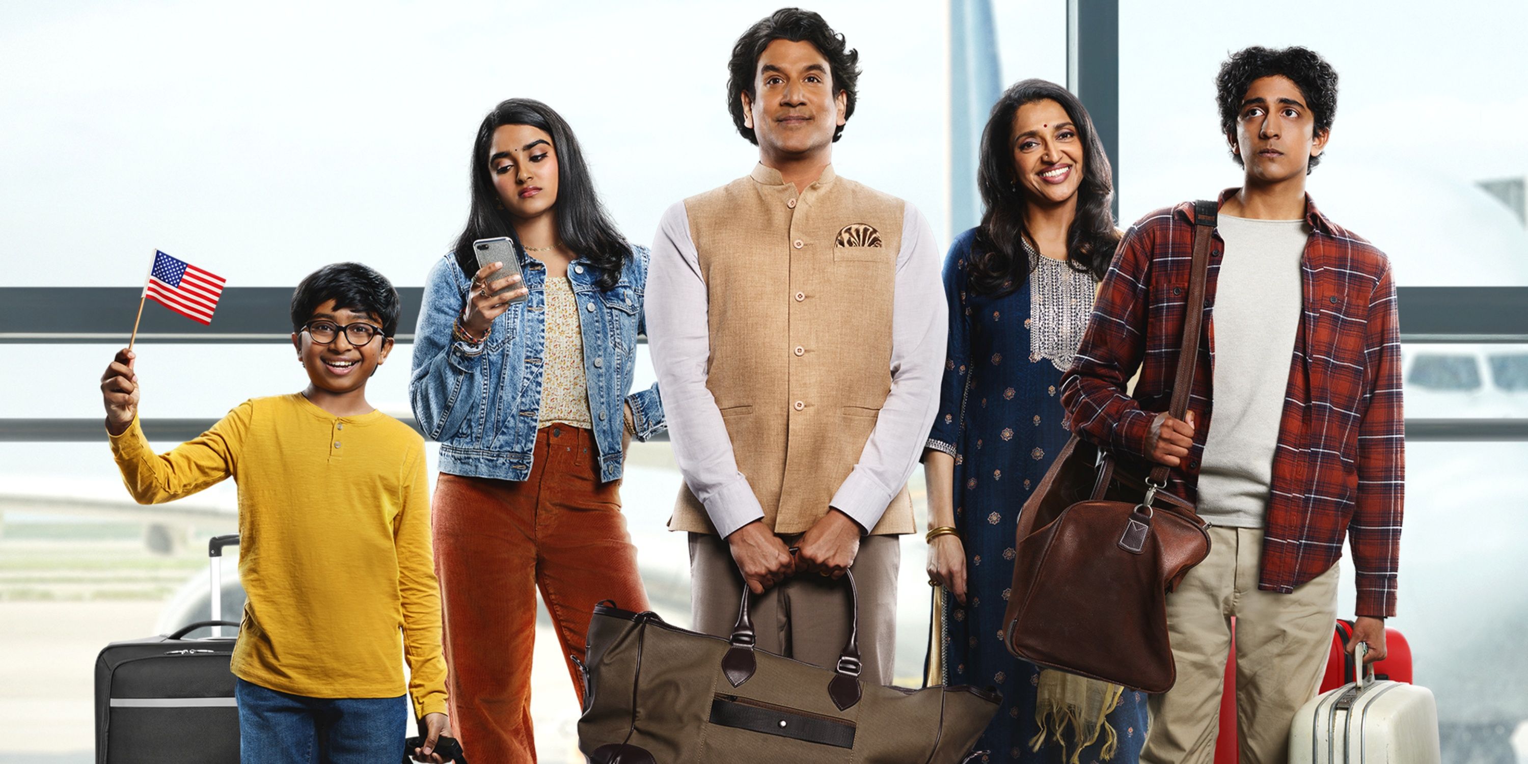 Naveen Andrews with Sindhu Vee and their three kids in the airport in The Pradeeps of Pittsburgh