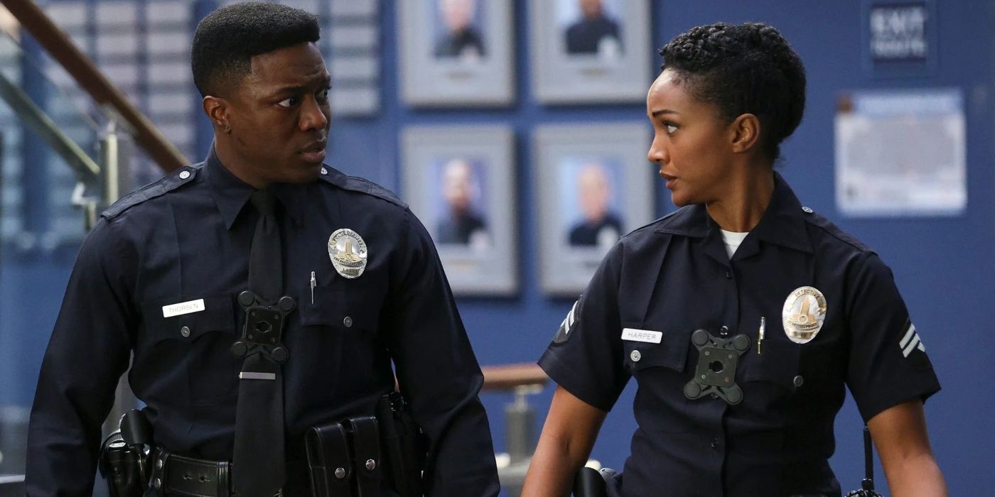 Aaron (Tru Valentino) and Nyla (Mekia Cox) stand side by side in uniform in &lsquo;The Rookie&rsquo;