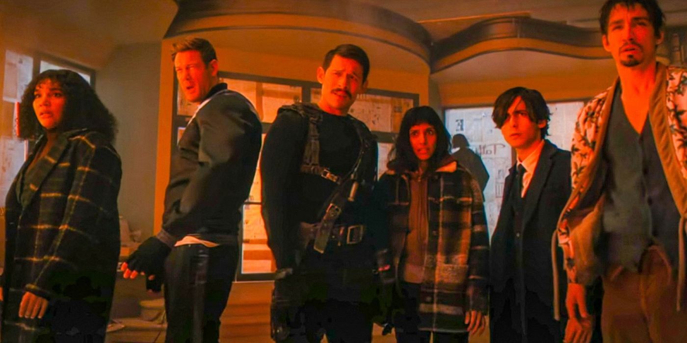 The Hargreeves family standing around in red lighting in The Umbrella Academy finale.