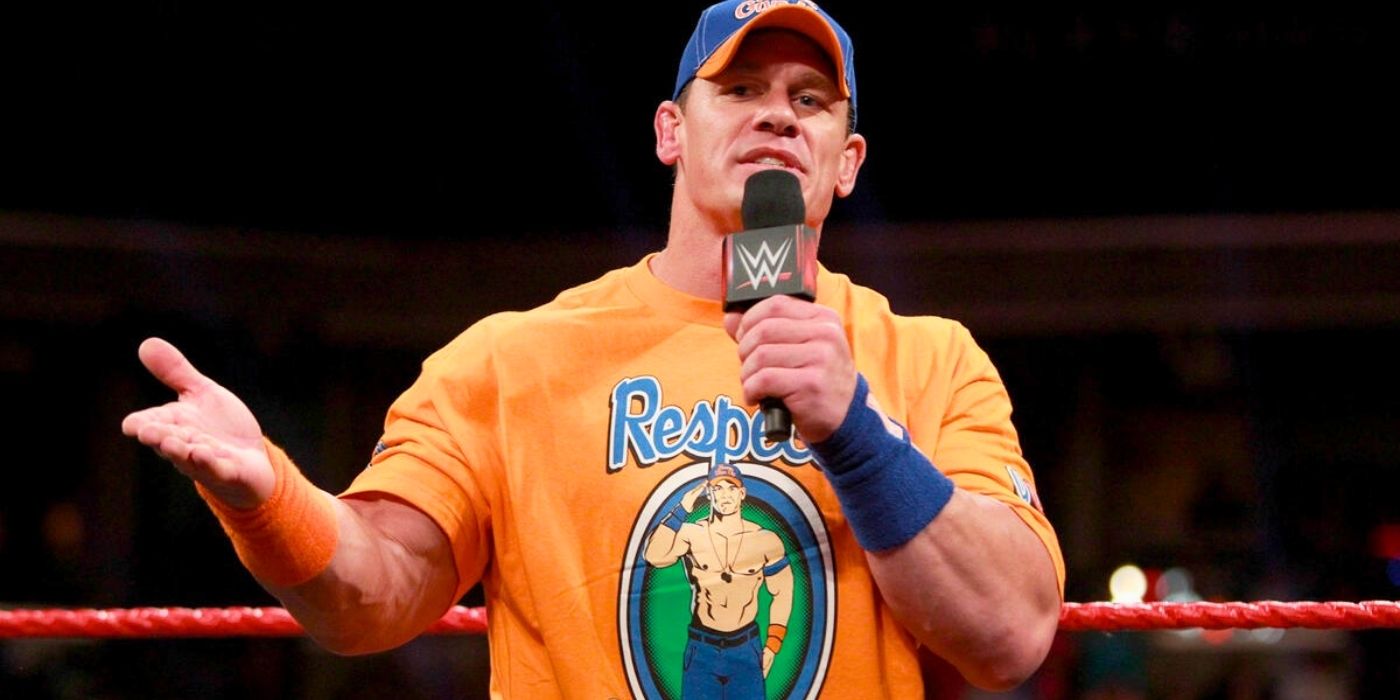 John Cena wearing an orange shirt that says Respect at WWE