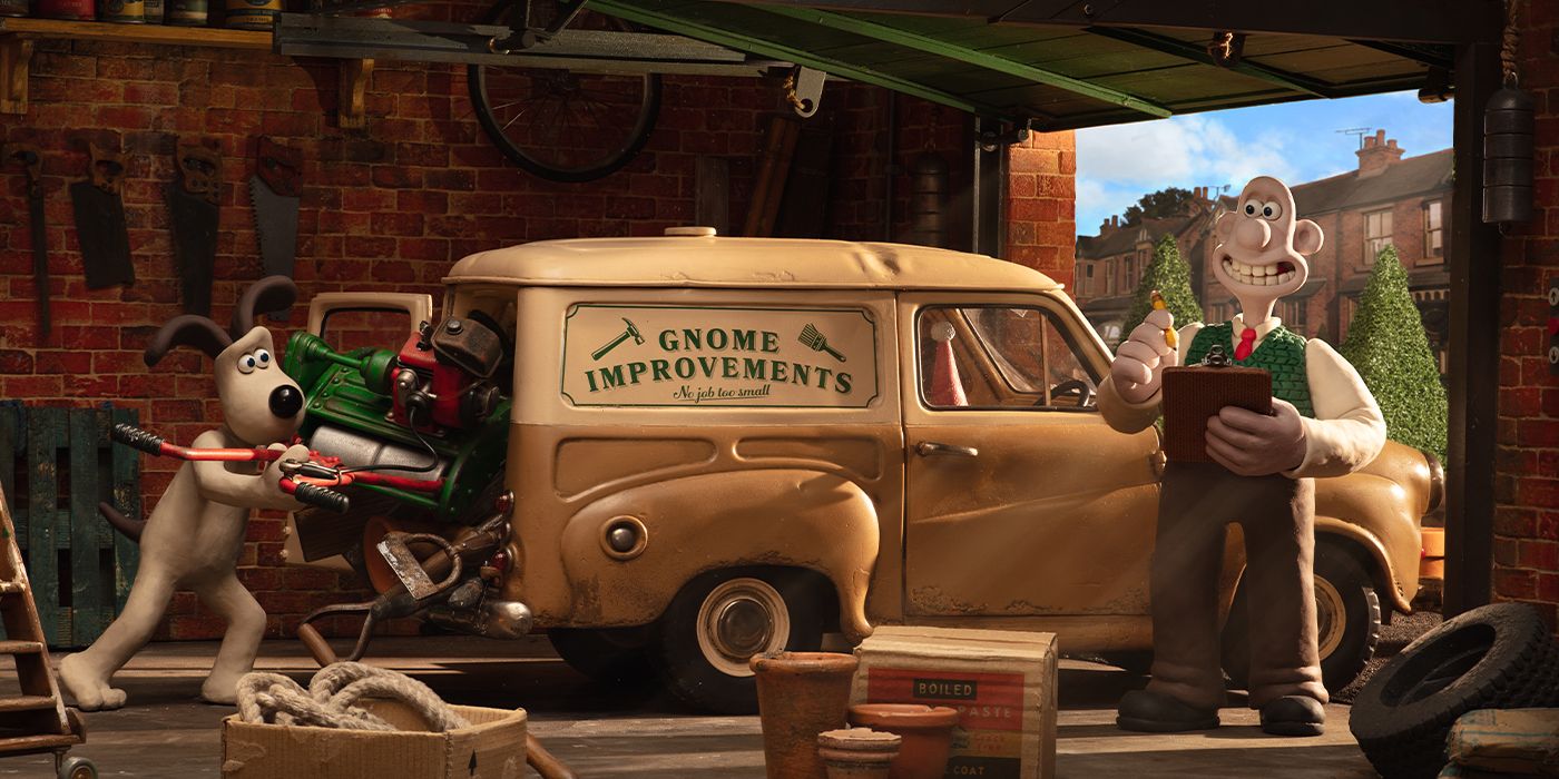 Gromit putting a machien into the trunk of Wallace's car and Wallace holding a clipboard