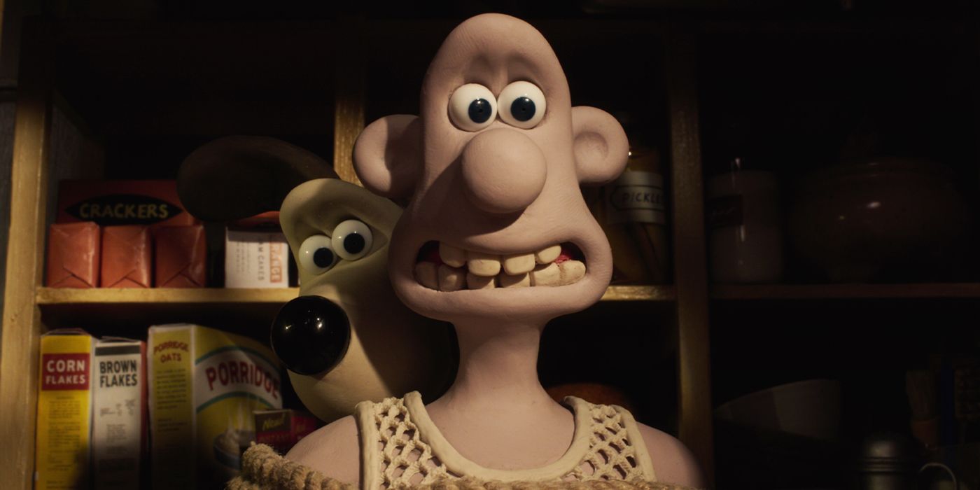 Gromit hiding behind Wallace in a dark pantry in Vengeance Most Fowl