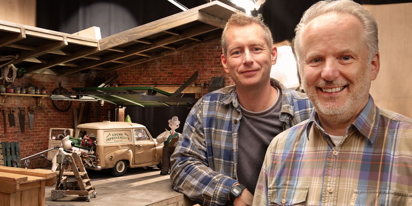 Directors Merlin Crossingham and Nick Park standing beside a model scene of Vengeance Most Fowl