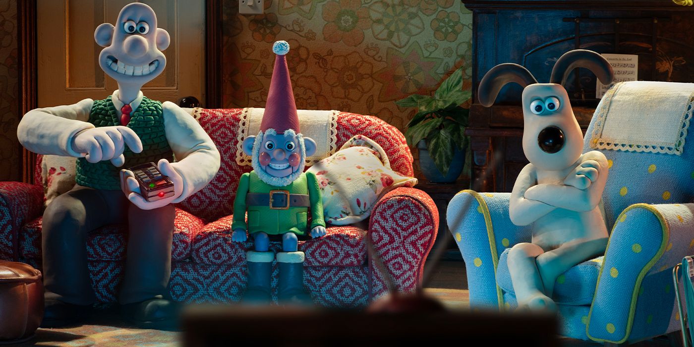 Wallace, Gromit, and Norbot watching TV in a living room in Vengeance Most Fowl