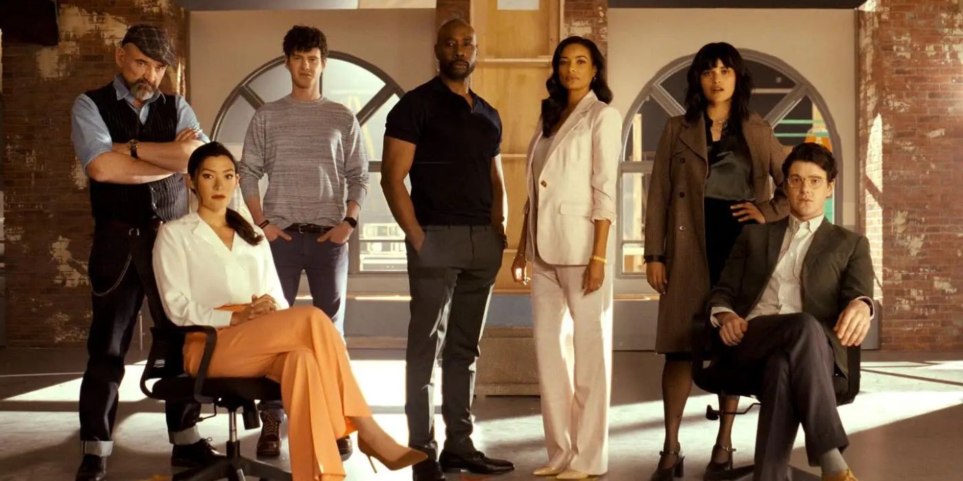 Morris Chestnut as Dr. Watson in the center of the cast of the CBS series Watson, including Rochelle Aytes