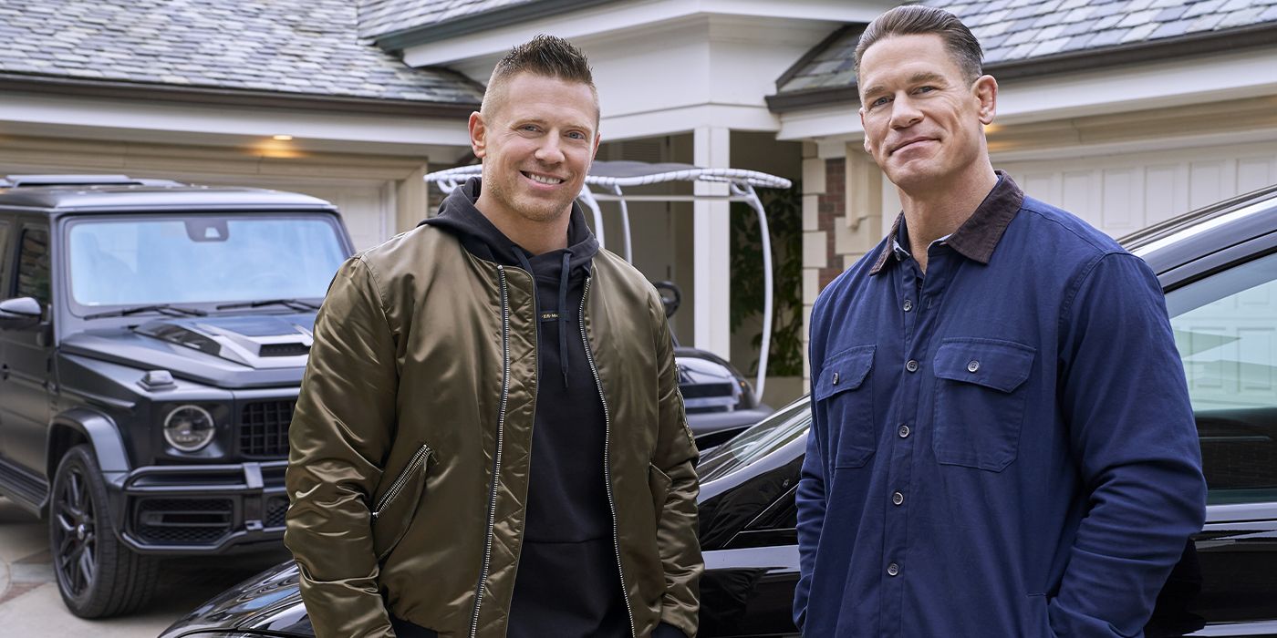 John Cena and Mike Mizanin posing in front of cars in What Drives You