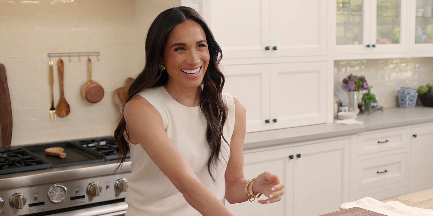 Meghan, Duchess of Sussex smiles in a kitchen on With Love, Meghan.