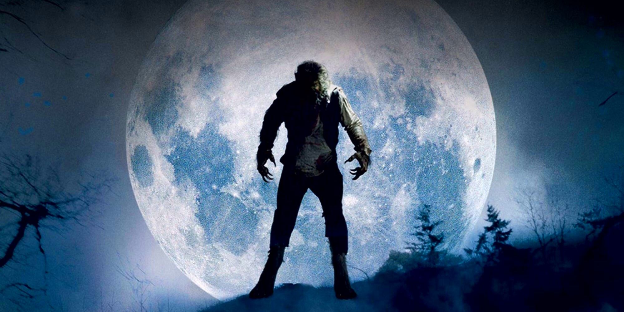 The figure of the Wolfman stands menacingly against a full moon.