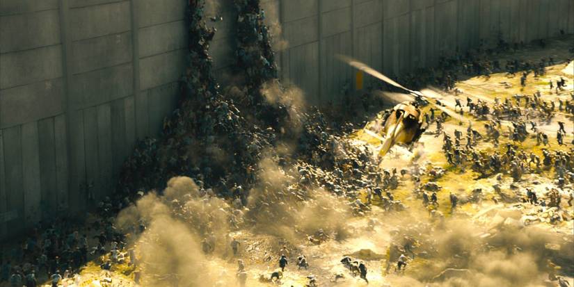 Zombies climbing a wall in World War Z.